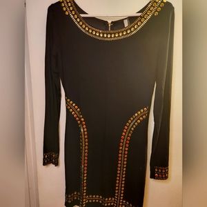Black mini dress with gold detail